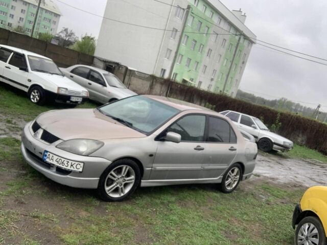 Сірий Міцубісі Lancer, об'ємом двигуна 2 л та пробігом 140 тис. км за 1400 $, фото 2 на Automoto.ua