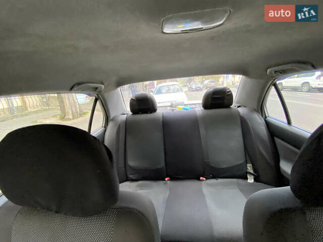 Серый Мицубиси Лансер, объемом двигателя 1.6 л и пробегом 444 тыс. км за 3400 $, фото 14 на Automoto.ua