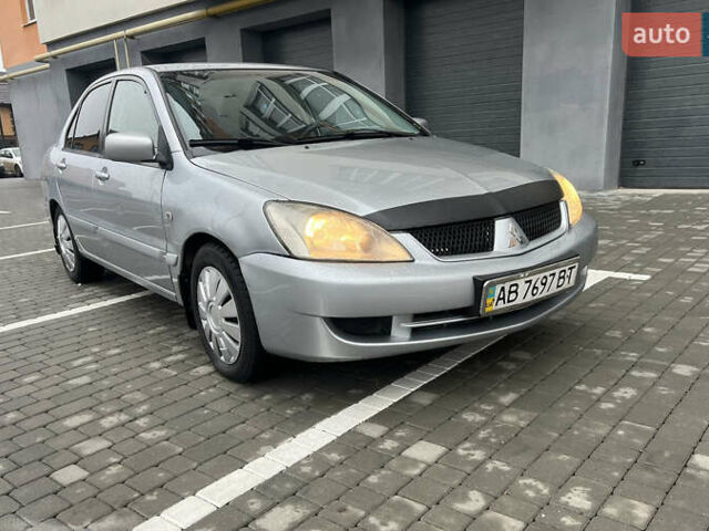 Сірий Міцубісі Lancer, об'ємом двигуна 1.58 л та пробігом 333 тис. км за 2950 $, фото 2 на Automoto.ua