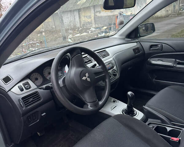 Сірий Міцубісі Lancer, об'ємом двигуна 1.6 л та пробігом 240 тис. км за 3000 $, фото 15 на Automoto.ua