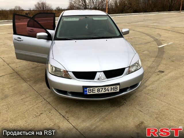Серый Мицубиси Лансер, объемом двигателя 1.6 л и пробегом 0 тыс. км за 4000 $, фото 10 на Automoto.ua
