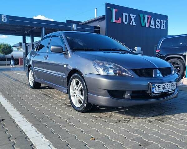 Мицубиси Лансер 2006 в Черновцах на Automoto.ua Серый Мицубиси Лансер, объемом двигателя 1.6 л и пробегом 299 тыс. км за 4300 $, фото 1 на Automoto.ua