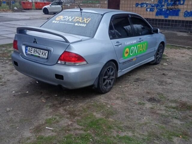Сірий Міцубісі Lancer, об'ємом двигуна 1.6 л та пробігом 264 тис. км за 3200 $, фото 2 на Automoto.ua