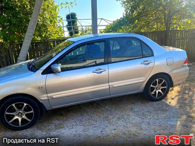 Сірий Міцубісі Lancer, об'ємом двигуна 1.6 л та пробігом 36 тис. км за 3500 $, фото 3 на Automoto.ua