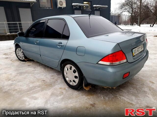 Сірий Міцубісі Lancer, об'ємом двигуна 1.6 л та пробігом 225 тис. км за 4650 $, фото 6 на Automoto.ua