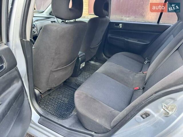 Сірий Міцубісі Lancer, об'ємом двигуна 1.58 л та пробігом 333 тис. км за 2999 $, фото 13 на Automoto.ua