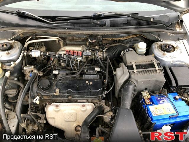 Серый Мицубиси Лансер, объемом двигателя 1.6 л и пробегом 0 тыс. км за 4000 $, фото 11 на Automoto.ua