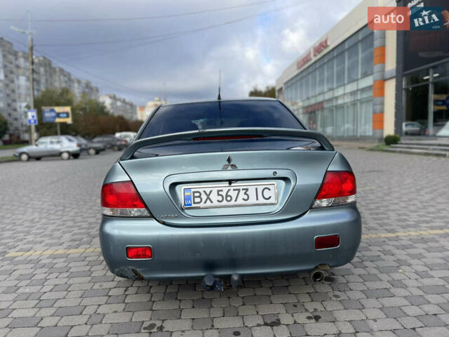 Серый Мицубиси Лансер, объемом двигателя 1.58 л и пробегом 350 тыс. км за 3300 $, фото 9 на Automoto.ua