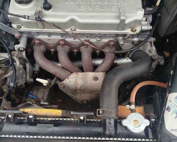 Сірий Міцубісі Lancer, об'ємом двигуна 2 л та пробігом 330 тис. км за 3450 $, фото 6 на Automoto.ua