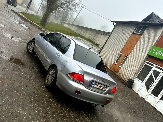 Серый Мицубиси Лансер, объемом двигателя 1.6 л и пробегом 123 тыс. км за 4000 $, фото 4 на Automoto.ua