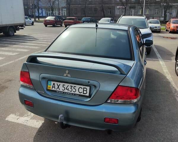 Сірий Міцубісі Lancer, об'ємом двигуна 1.6 л та пробігом 212 тис. км за 4700 $, фото 2 на Automoto.ua