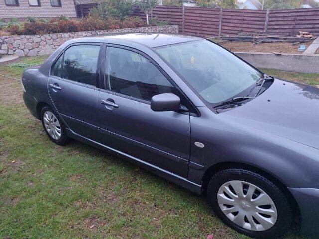 Сірий Міцубісі Lancer, об'ємом двигуна 1.6 л та пробігом 190 тис. км за 3500 $, фото 3 на Automoto.ua
