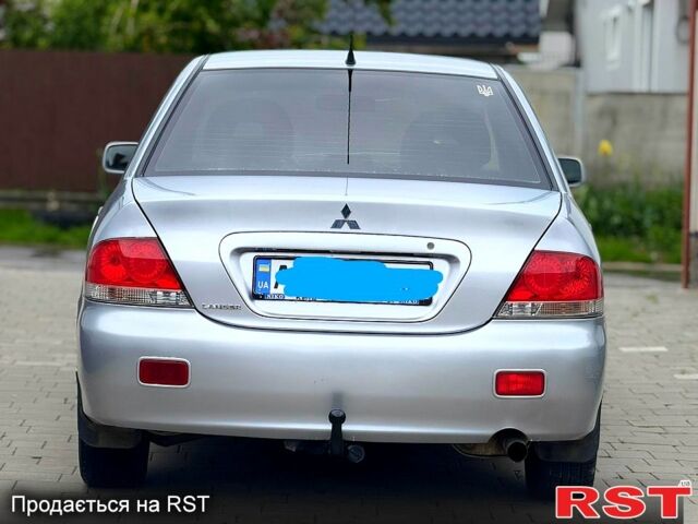 Сірий Міцубісі Lancer, об'ємом двигуна 1.6 л та пробігом 200 тис. км за 4000 $, фото 1 на Automoto.ua