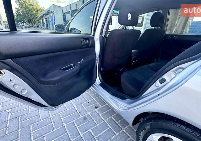 Сірий Міцубісі Lancer, об'ємом двигуна 1.6 л та пробігом 263 тис. км за 4900 $, фото 32 на Automoto.ua