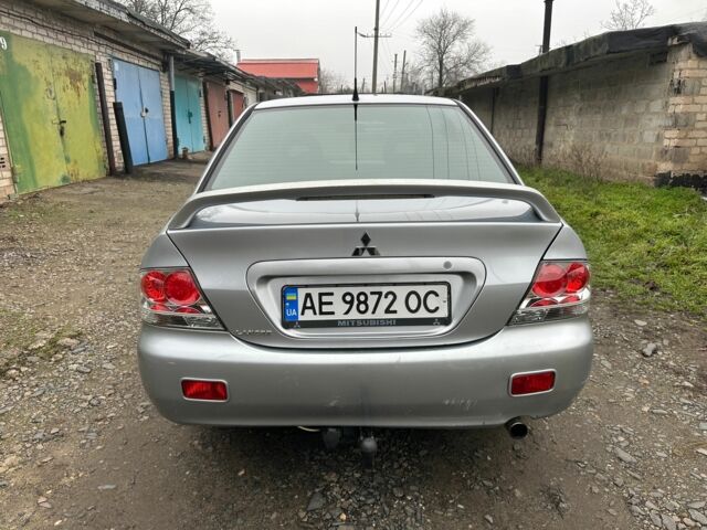 Сірий Міцубісі Lancer, об'ємом двигуна 1.6 л та пробігом 270 тис. км за 2900 $, фото 4 на Automoto.ua