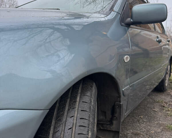 Сірий Міцубісі Lancer, об'ємом двигуна 1.6 л та пробігом 240 тис. км за 3000 $, фото 10 на Automoto.ua