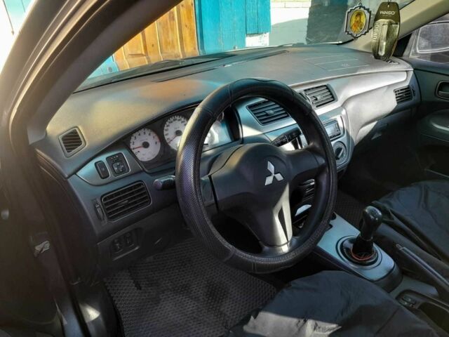 Сірий Міцубісі Lancer, об'ємом двигуна 1.6 л та пробігом 202 тис. км за 3300 $, фото 3 на Automoto.ua
