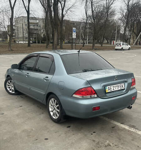Сірий Міцубісі Lancer, об'ємом двигуна 1.58 л та пробігом 267 тис. км за 5300 $, фото 3 на Automoto.ua