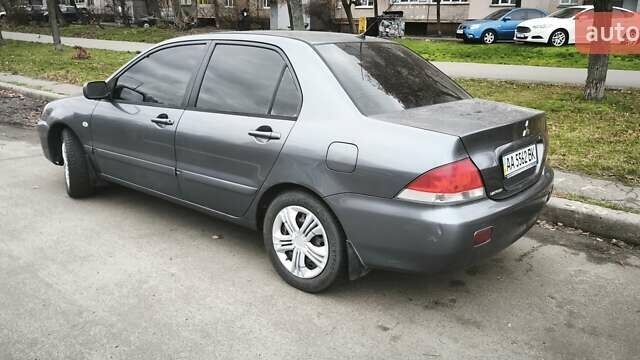 Серый Мицубиси Лансер, объемом двигателя 1.6 л и пробегом 263 тыс. км за 3650 $, фото 5 на Automoto.ua