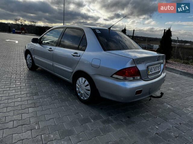 Сірий Міцубісі Lancer, об'ємом двигуна 1.58 л та пробігом 333 тис. км за 2700 $, фото 8 на Automoto.ua