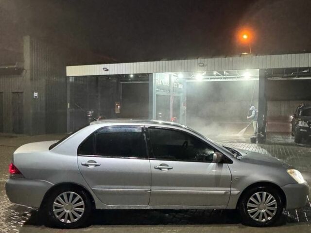 Серый Мицубиси Лансер, объемом двигателя 1.6 л и пробегом 330 тыс. км за 3200 $, фото 4 на Automoto.ua