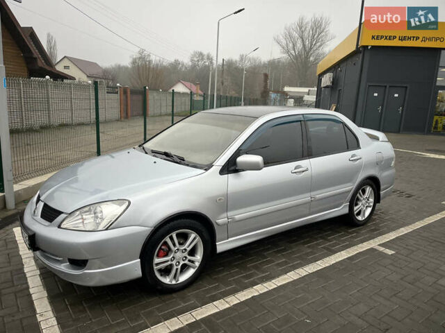 Сірий Міцубісі Lancer, об'ємом двигуна 2 л та пробігом 187 тис. км за 4500 $, фото 6 на Automoto.ua