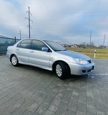 Серый Мицубиси Лансер, объемом двигателя 1.6 л и пробегом 253 тыс. км за 2850 $, фото 7 на Automoto.ua