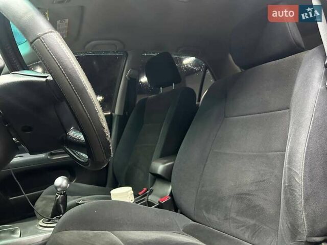 Серый Мицубиси Лансер, объемом двигателя 1.58 л и пробегом 300 тыс. км за 4600 $, фото 6 на Automoto.ua
