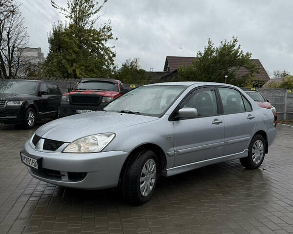 Міцубісі Lancer 2006 у Житомирі на Automoto.ua Сірий Міцубісі Lancer, об'ємом двигуна 1.58 л та пробігом 195 тис. км за 4999 $, фото 6 на Automoto.ua