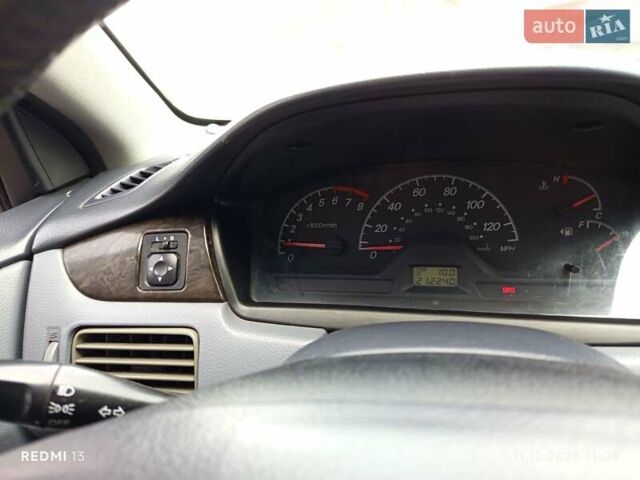 Сірий Міцубісі Lancer, об'ємом двигуна 2 л та пробігом 212 тис. км за 3333 $, фото 5 на Automoto.ua