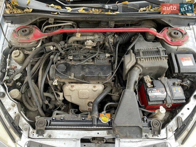 Серый Мицубиси Лансер, объемом двигателя 1.6 л и пробегом 444 тыс. км за 3400 $, фото 8 на Automoto.ua