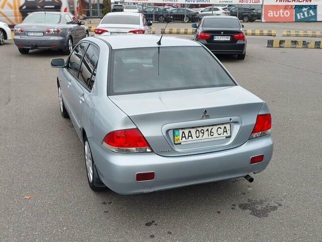 Мицубиси Лансер 2006 в Киеве на Automoto.ua Серый Мицубиси Лансер, объемом двигателя 1.6 л и пробегом 426 тыс. км за 3800 $, фото 1 на Automoto.ua