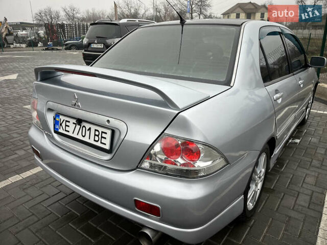 Сірий Міцубісі Lancer, об'ємом двигуна 2 л та пробігом 187 тис. км за 4500 $, фото 10 на Automoto.ua