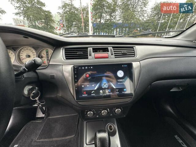 Серый Мицубиси Лансер, объемом двигателя 1.58 л и пробегом 183 тыс. км за 4800 $, фото 20 на Automoto.ua