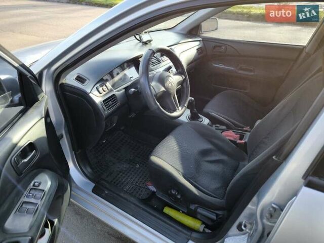 Серый Мицубиси Лансер, объемом двигателя 1.6 л и пробегом 344 тыс. км за 3400 $, фото 4 на Automoto.ua