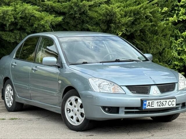 Серый Мицубиси Лансер, объемом двигателя 1.6 л и пробегом 220 тыс. км за 4400 $, фото 4 на Automoto.ua