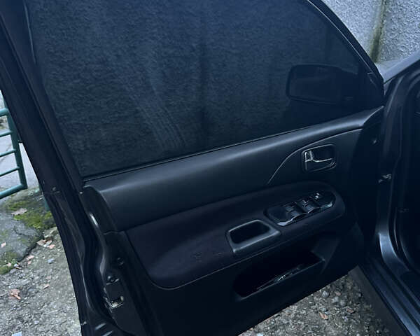 Сірий Міцубісі Lancer, об'ємом двигуна 2 л та пробігом 200 тис. км за 4999 $, фото 14 на Automoto.ua