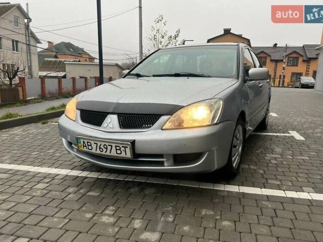 Серый Мицубиси Лансер, объемом двигателя 1.6 л и пробегом 333 тыс. км за 2800 $, фото 2 на Automoto.ua