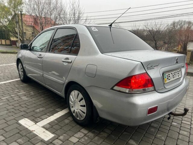 Серый Мицубиси Лансер, объемом двигателя 1.6 л и пробегом 333 тыс. км за 2800 $, фото 5 на Automoto.ua