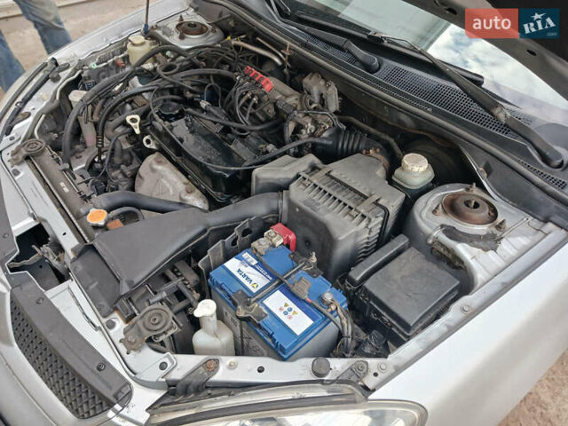 Серый Мицубиси Лансер, объемом двигателя 1.58 л и пробегом 215 тыс. км за 4000 $, фото 9 на Automoto.ua