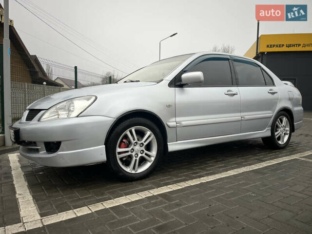Сірий Міцубісі Lancer, об'ємом двигуна 2 л та пробігом 187 тис. км за 4500 $, фото 5 на Automoto.ua