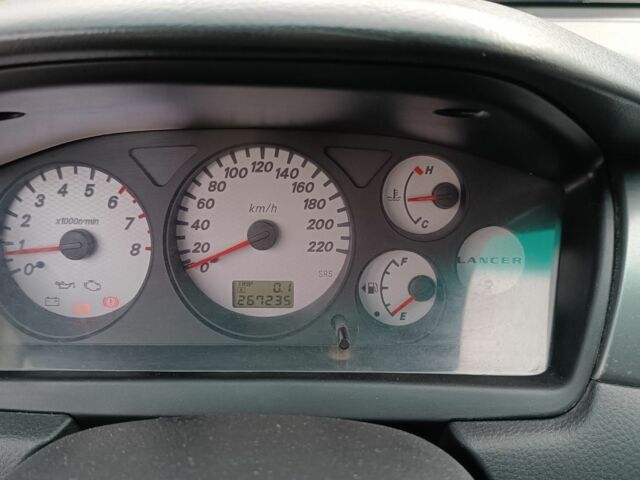 Сірий Міцубісі Lancer, об'ємом двигуна 1.6 л та пробігом 267 тис. км за 3600 $, фото 8 на Automoto.ua
