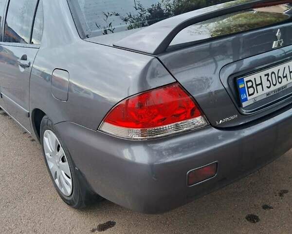 Сірий Міцубісі Lancer, об'ємом двигуна 1.6 л та пробігом 229 тис. км за 4900 $, фото 3 на Automoto.ua