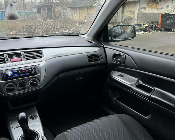 Сірий Міцубісі Lancer, об'ємом двигуна 1.6 л та пробігом 240 тис. км за 3000 $, фото 16 на Automoto.ua