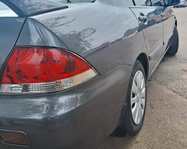 Сірий Міцубісі Lancer, об'ємом двигуна 1.6 л та пробігом 229 тис. км за 4900 $, фото 19 на Automoto.ua
