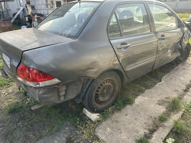 Сірий Міцубісі Lancer, об'ємом двигуна 1.6 л та пробігом 200 тис. км за 1150 $, фото 3 на Automoto.ua