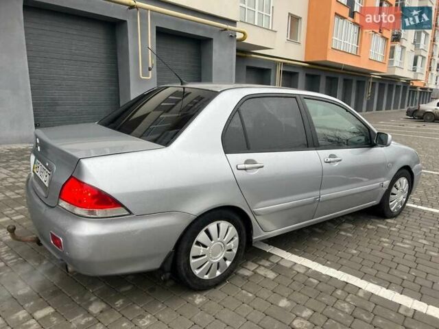 Серый Мицубиси Лансер, объемом двигателя 1.6 л и пробегом 333 тыс. км за 2800 $, фото 9 на Automoto.ua