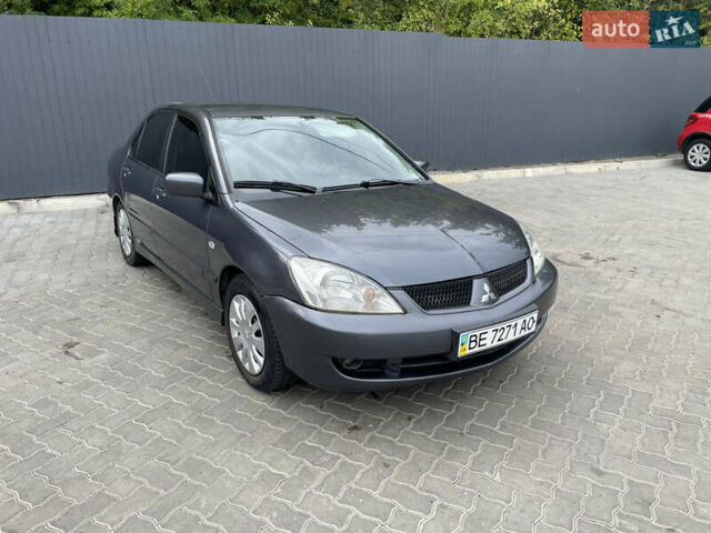 Сірий Міцубісі Lancer, об'ємом двигуна 1.58 л та пробігом 162 тис. км за 4650 $, фото 2 на Automoto.ua