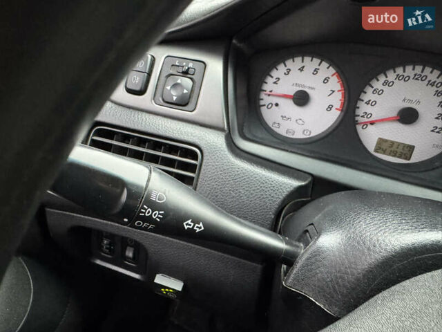 Серый Мицубиси Лансер, объемом двигателя 1.6 л и пробегом 242 тыс. км за 4300 $, фото 23 на Automoto.ua