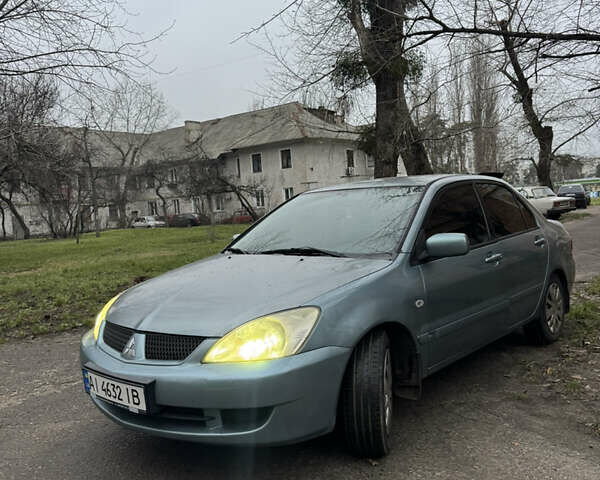 Сірий Міцубісі Lancer, об'ємом двигуна 1.6 л та пробігом 240 тис. км за 3000 $, фото 2 на Automoto.ua